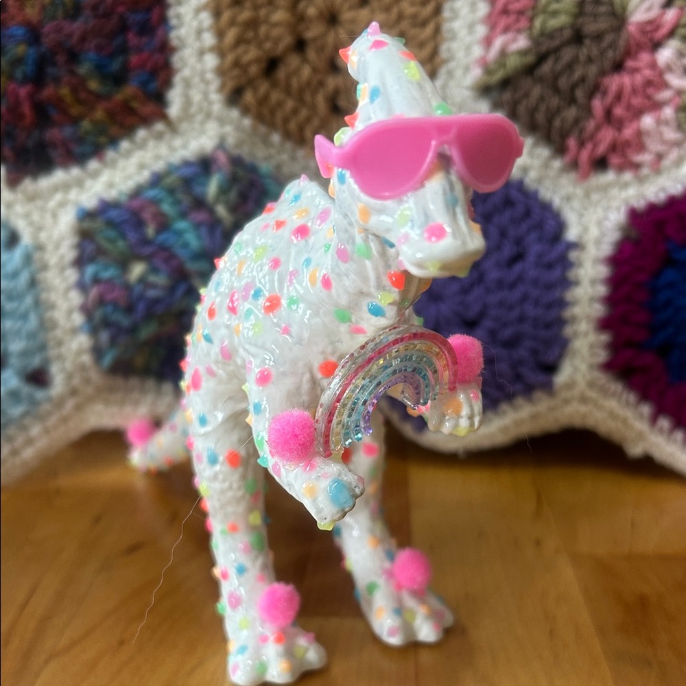 Glow in the dark upcycled dinosaur figurine - pride ally